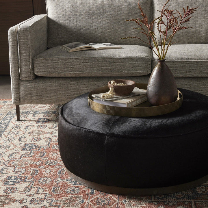 Spencer Large Round Ottoman - Dark Hair on Hide