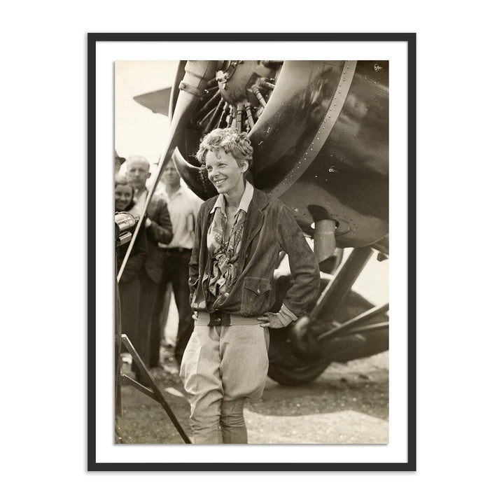 Amelia Earhart Beside Her Plane By Getty Images - 24"X32" - Black Maple