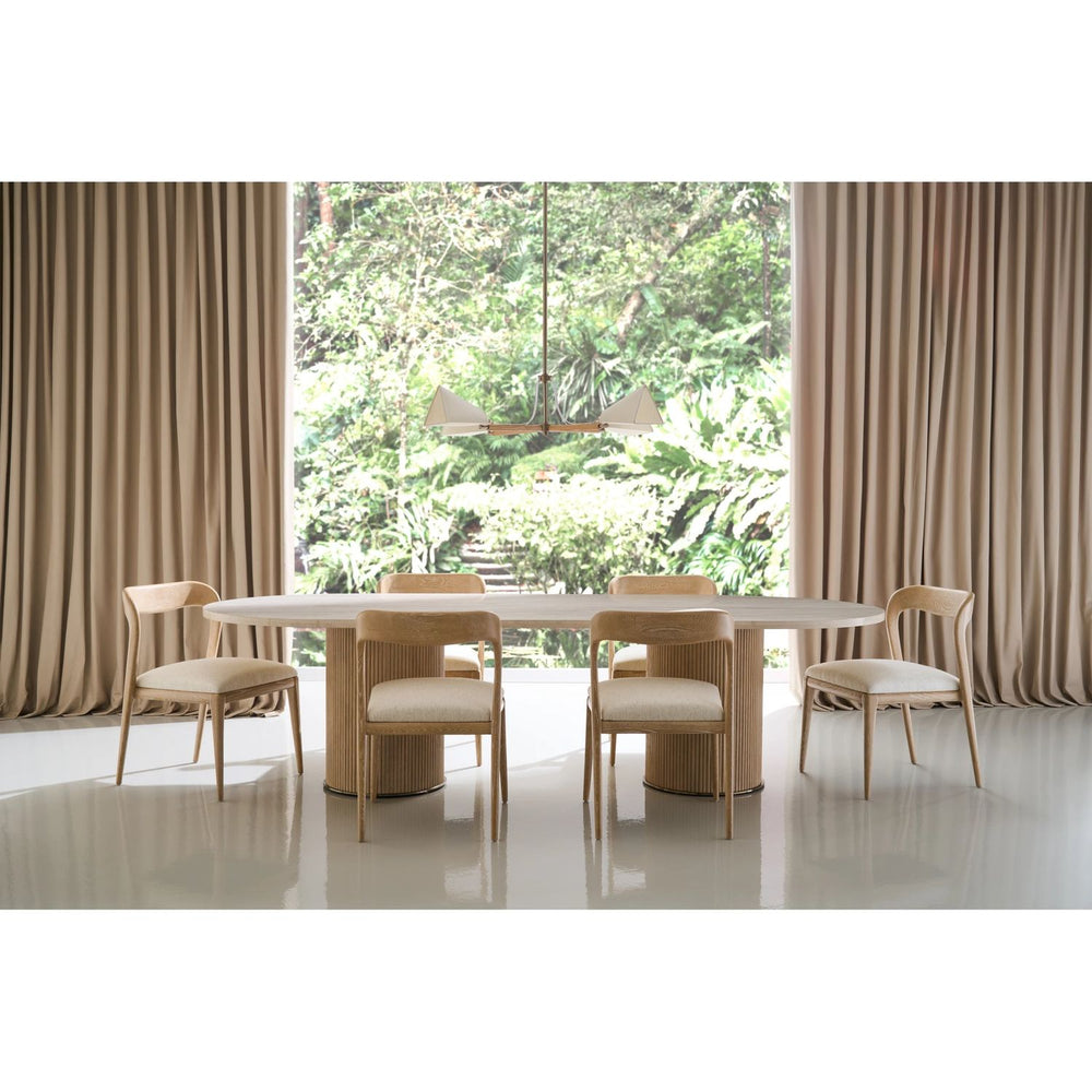 Additional view of Rhythm Oval Stone Top Dining Table 112 in ivory and beige.