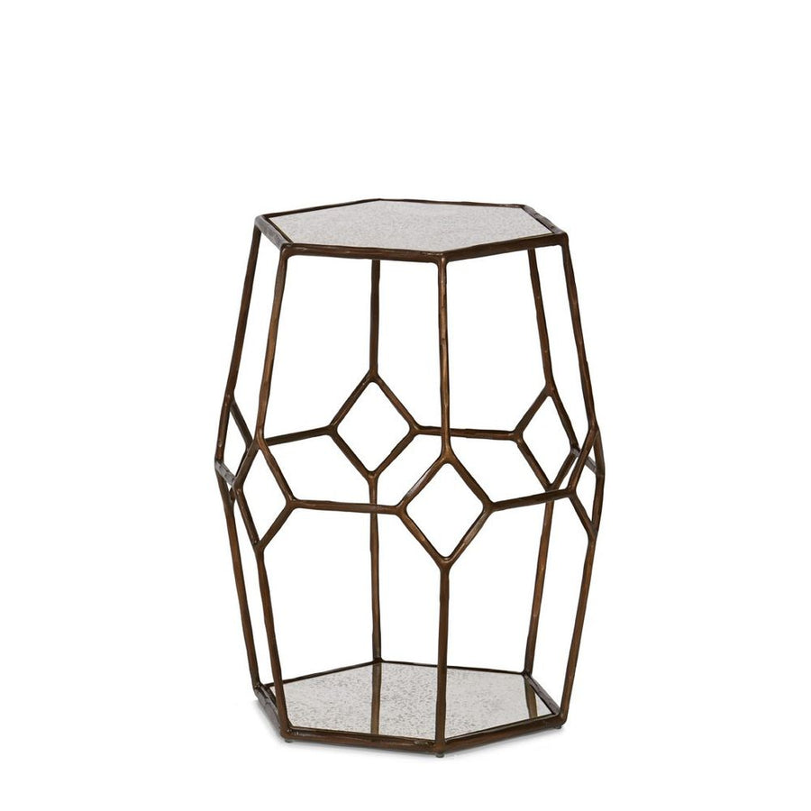 Geometric metal side table with open framework and a mirrored top and bottom surface, in a bronze finish.