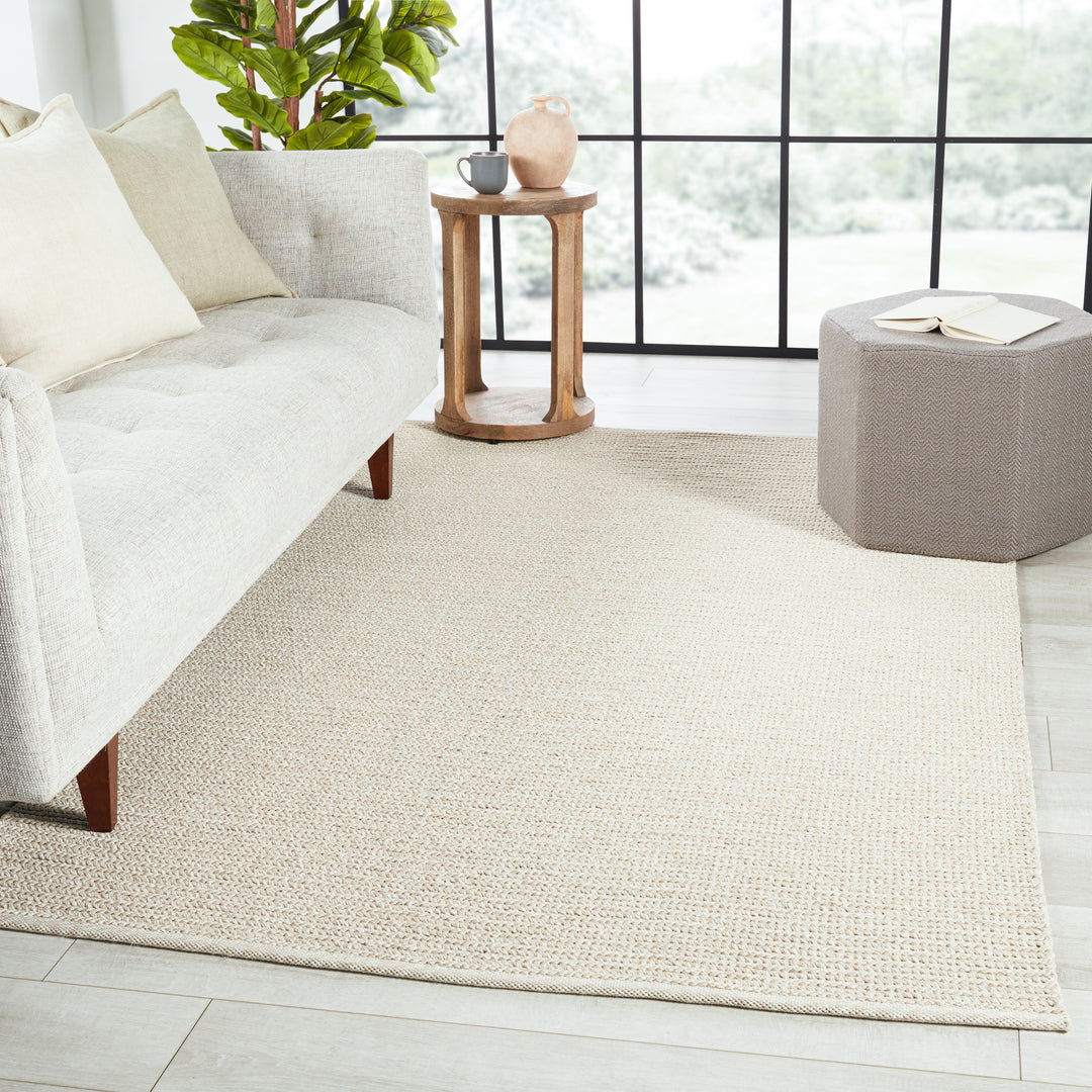 Batal Indoor/ Outdoor Solid Beige/ Ivory Area Rug (2'X3')