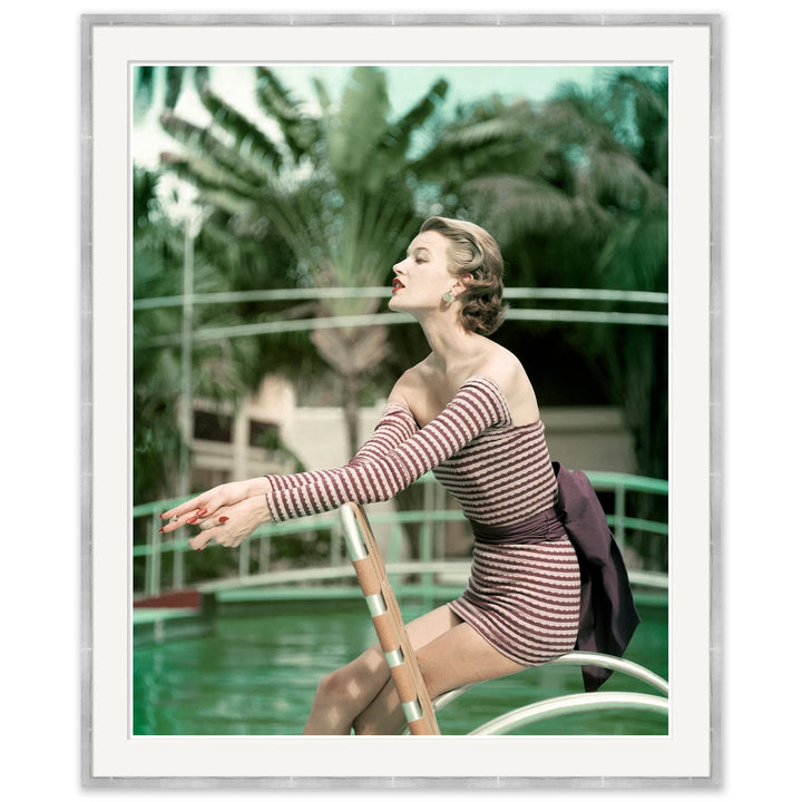 Vogue Magazine, "Model in a Long Sleeved Swimsuit", John Rawlings, May 1954 by Soicher Marin