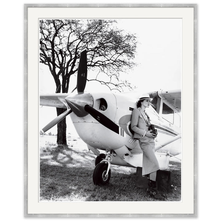 Vogue Magazine, "Keira Knightley Leaning on Plane", Arthur Elgort, June 2007 by Soicher Marin