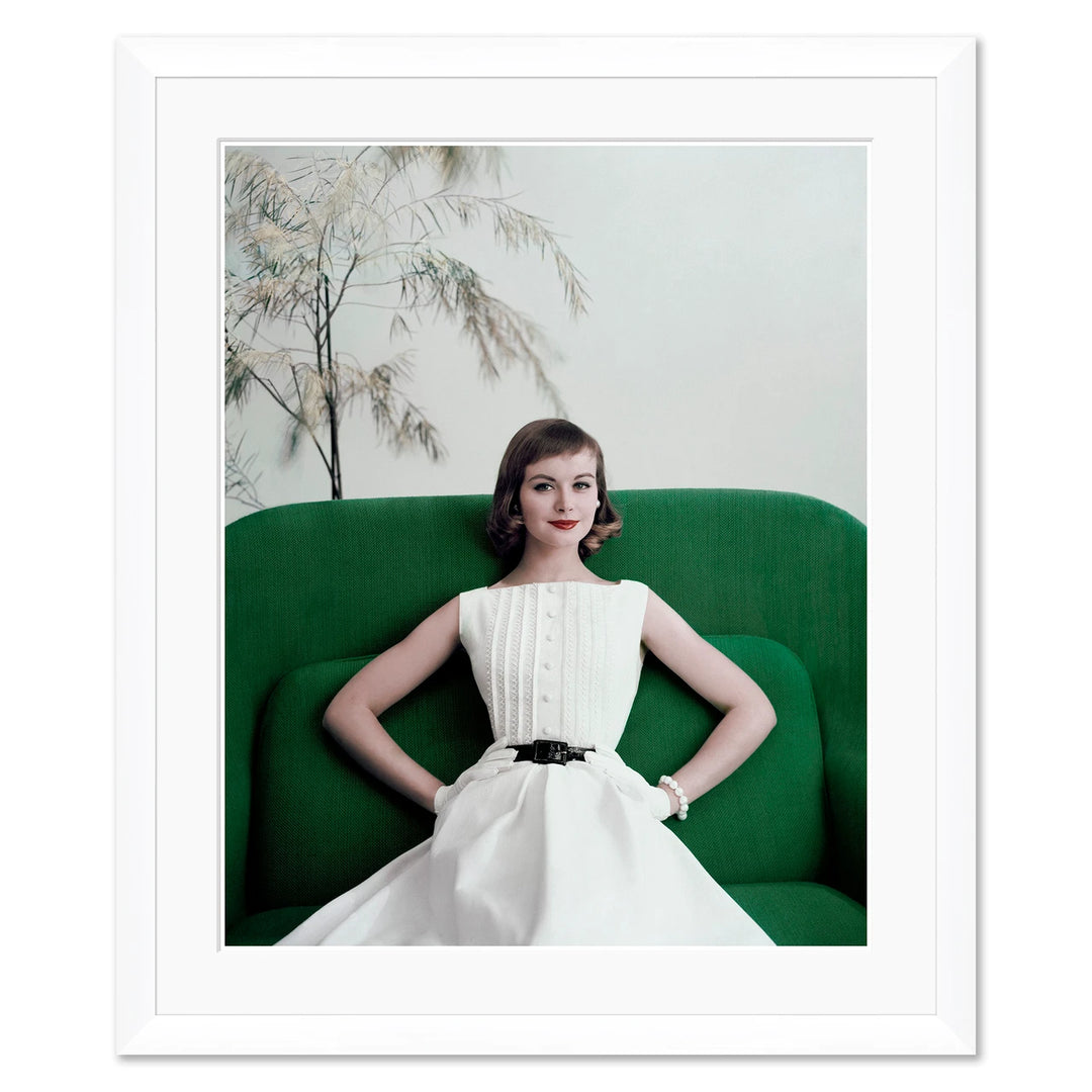 Glamour, "Model Phyllis Newell Sitting on a Green Sofa," Frances McLaughlin-Gill, June 1, 1956 by Soicher Marin