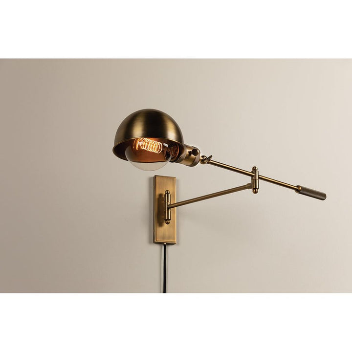 Cannon Plug-In Sconce - Patina Brass