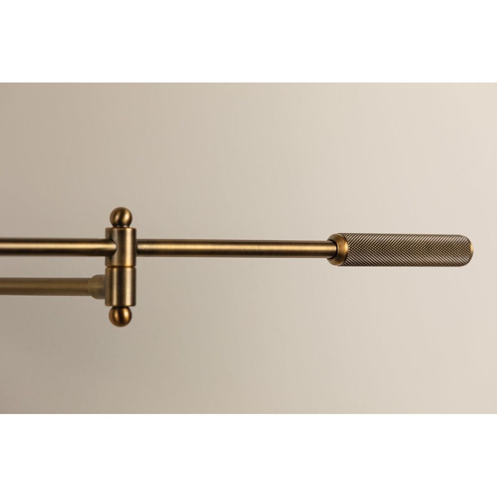 Cannon Plug-In Sconce - Patina Brass