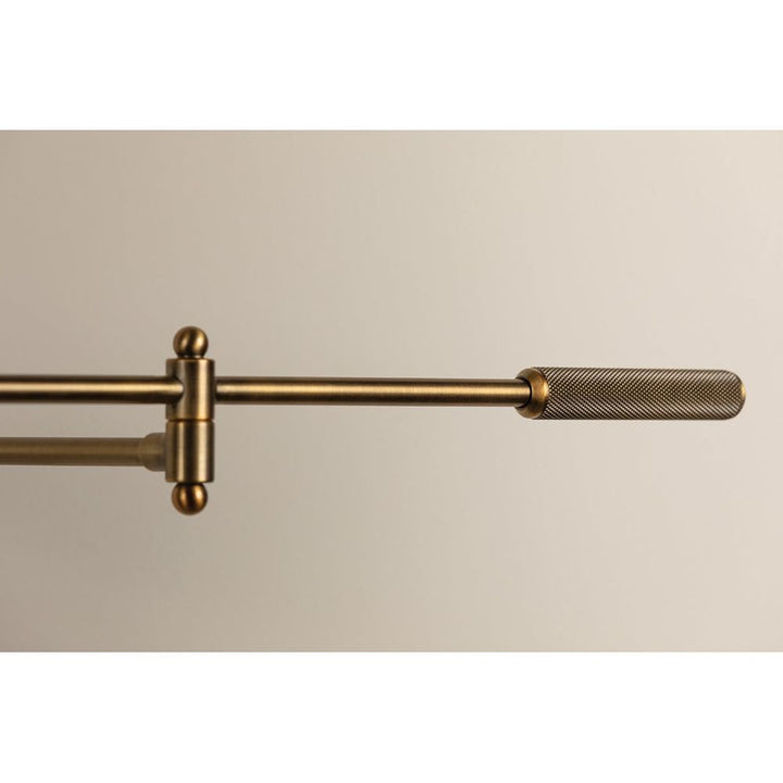 Cannon Plug-In Sconce - Patina Brass