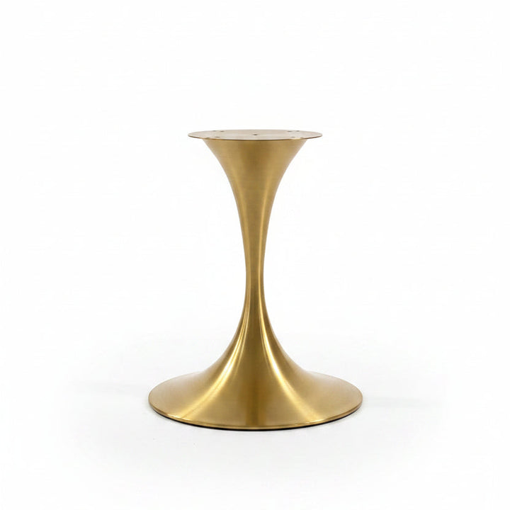 A modern tulip-style side table base in brushed brass, featuring a flared circular top and a curved, tapered pedestal base, set against a plain white background.