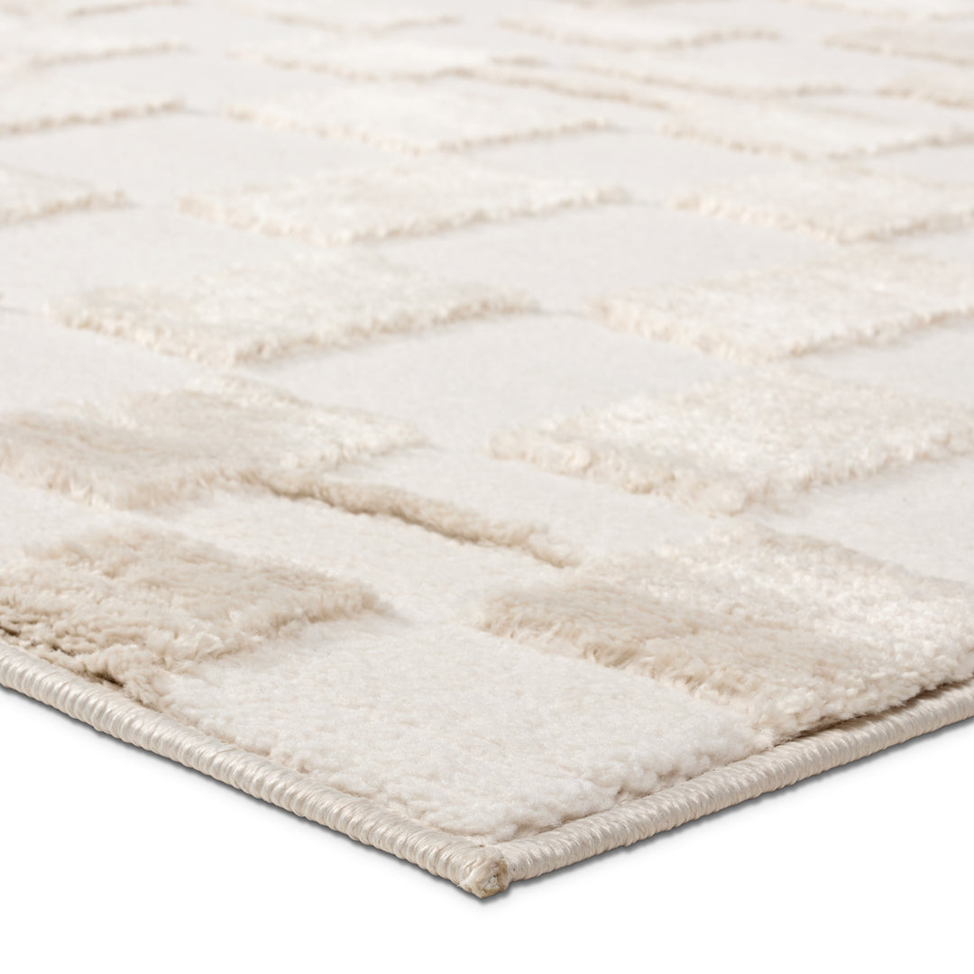 Vibe by Jaipur Living Kohar Geometric White/Tan Area Rug (6'3"x9'6")