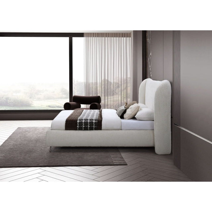 Lucia Fabric Wingback Bed