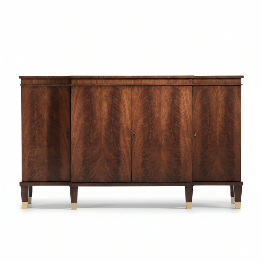 A mid-century modern wooden credenza with four doors, rich brown burl wood grain, and tapered legs