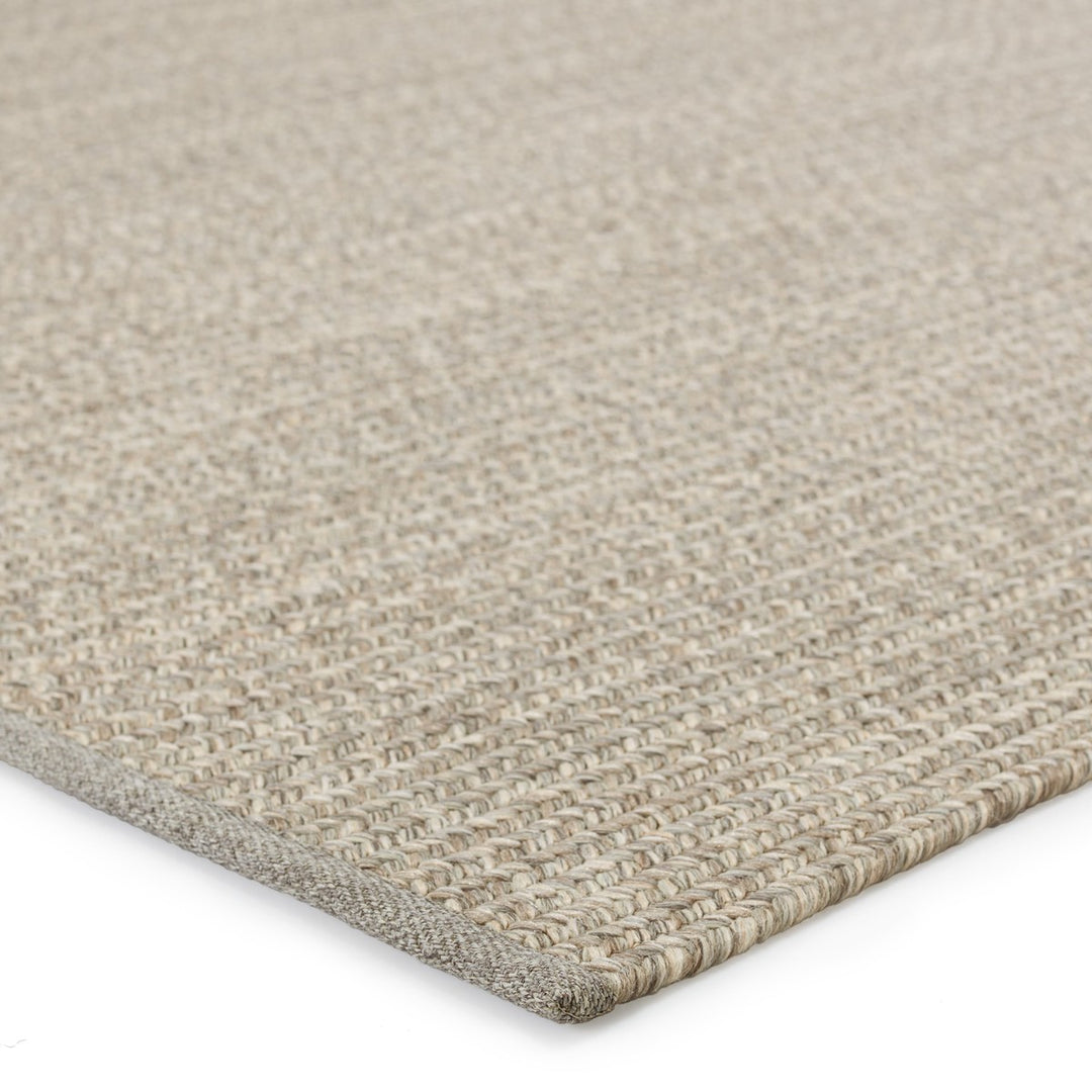 Jaipur Living Sven Indoor/ Outdoor Solid Taupe/ Cream Area Rug (7'6"X9'6")