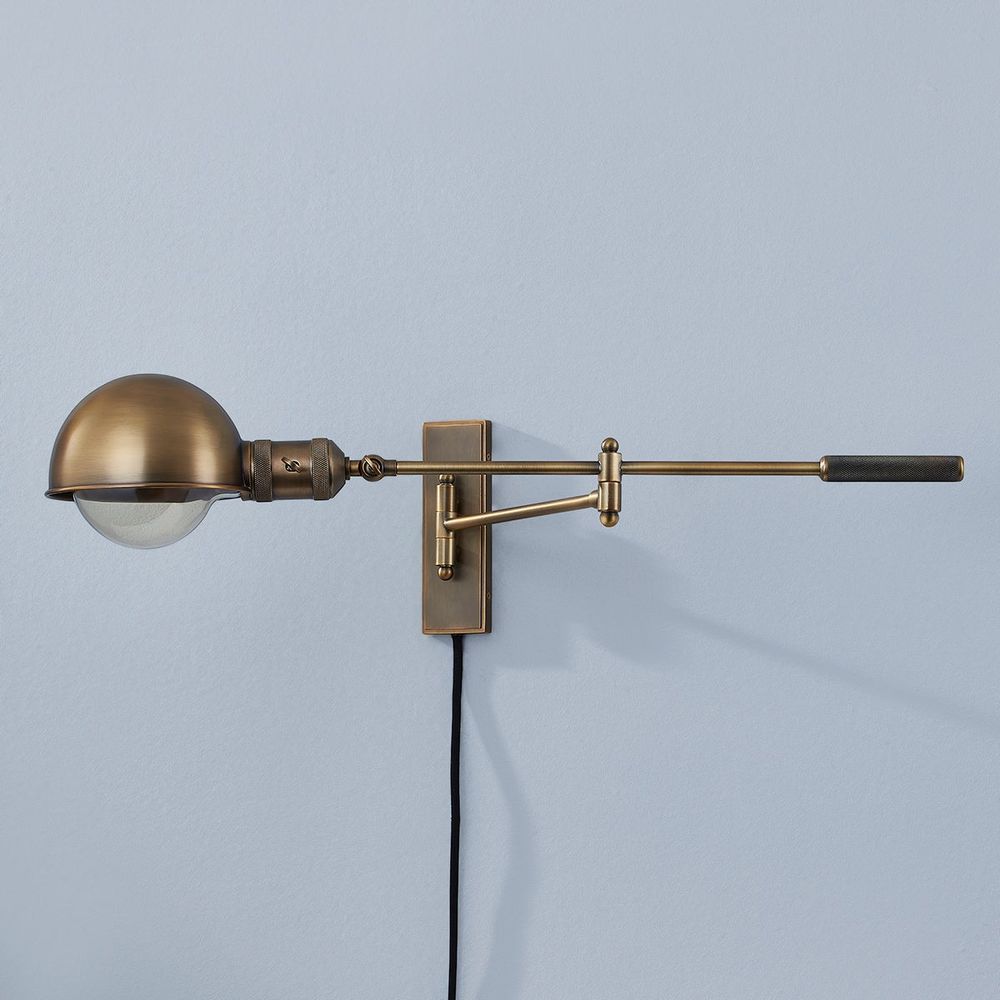 Wall Lighting Cannon Plug-In Sconce - Patina Brass