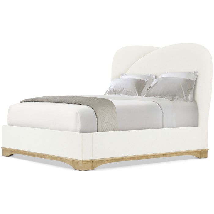 Origins US King Bed, shown in ivory and white with upholstery fabric, wood, and integrated upholstered headboard.