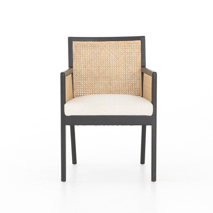 Front view of the Four Hands Antonia Cane Dining Arm Chair in brushed ebony