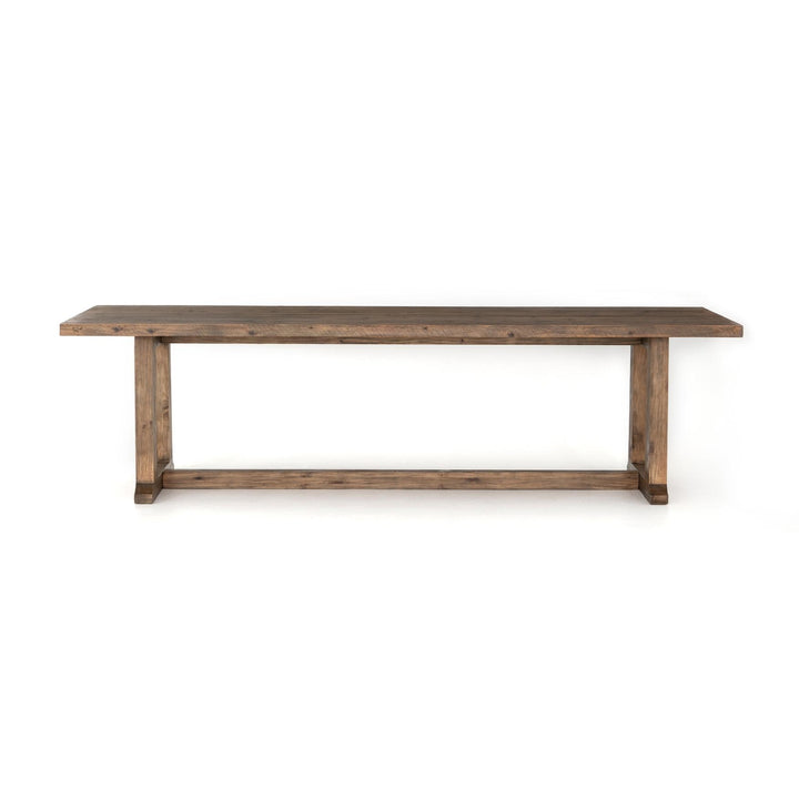 Front view of the Four Hands Otto 110-inch Dining Table in waxed bleached pine