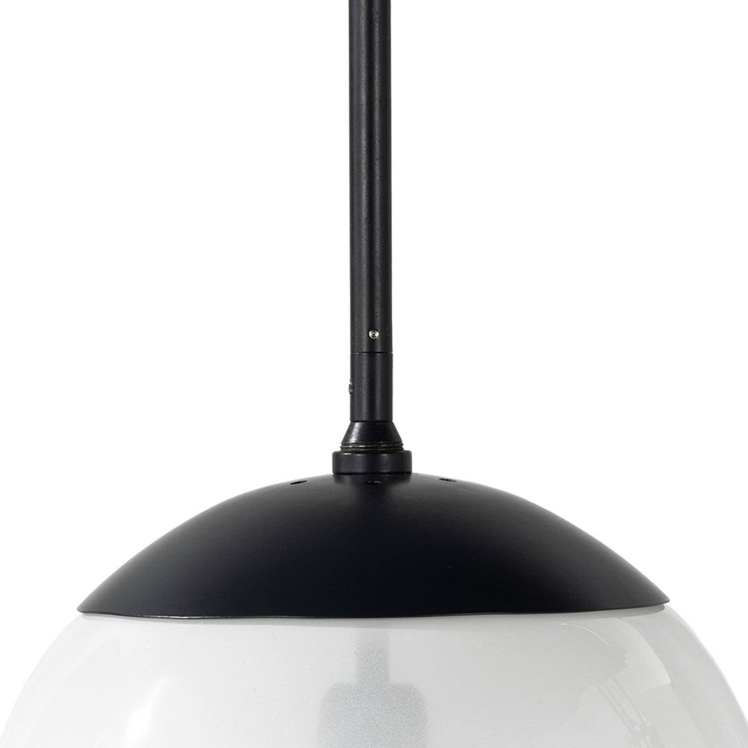 Detail of the Sutton Small Pendant black metal stem and globe cap