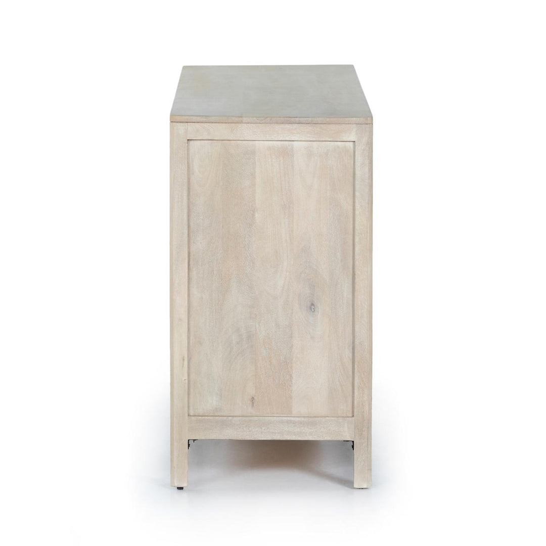 Side view of the Sydney 6-Drawer Dresser showing the natural mango wood cabinet