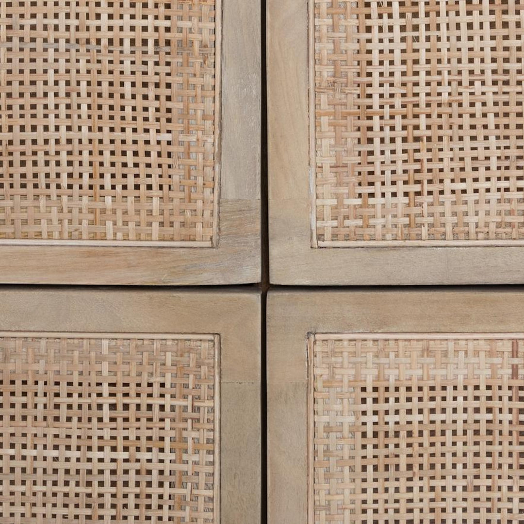Close-up of the Sydney dresser woven cane drawer fronts and natural mango wood frame