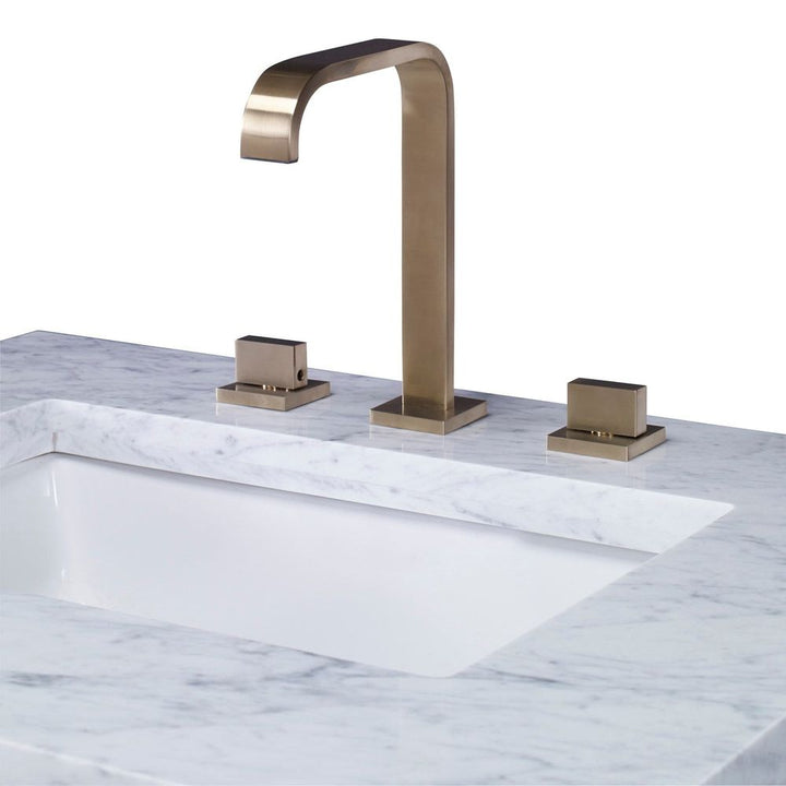 Kingsley Brass Faucet, shown in brass and warm gold with brass, metal, and a widespread three-hole deck mount.