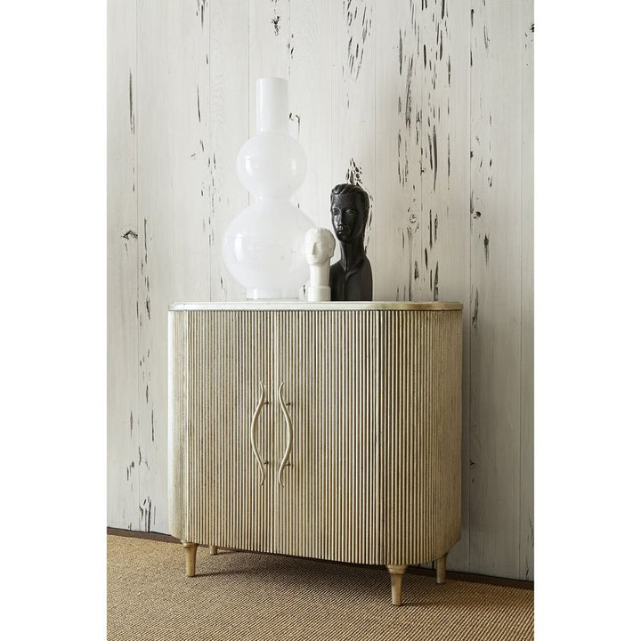Pippa Cabinet, shown in cream and ivory with wood, stone or marble top, and two-door cabinet storage.