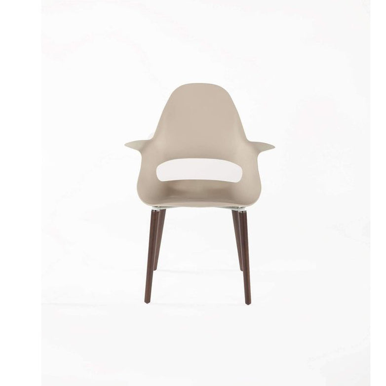 Beige chair with wooden legs on a white background